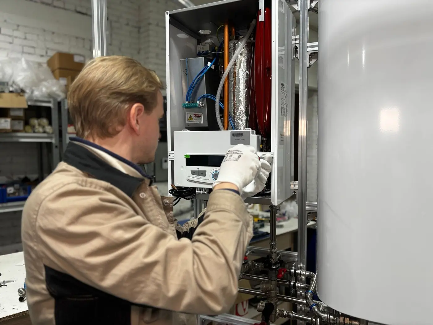 Licensed plumber replacing a hot water tank in Abbotsford, BC